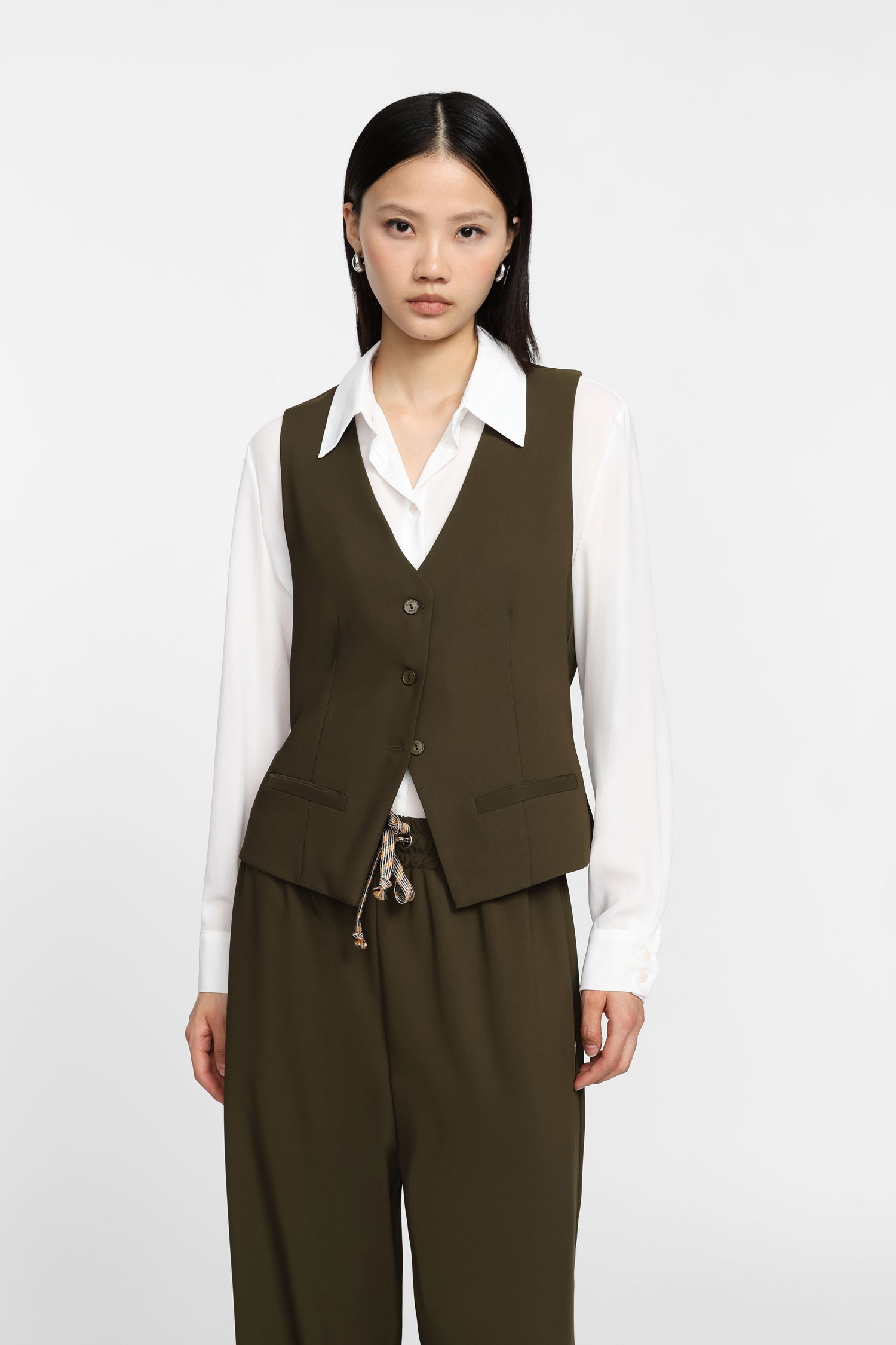 Image of Gilet con chiusura monopetto060