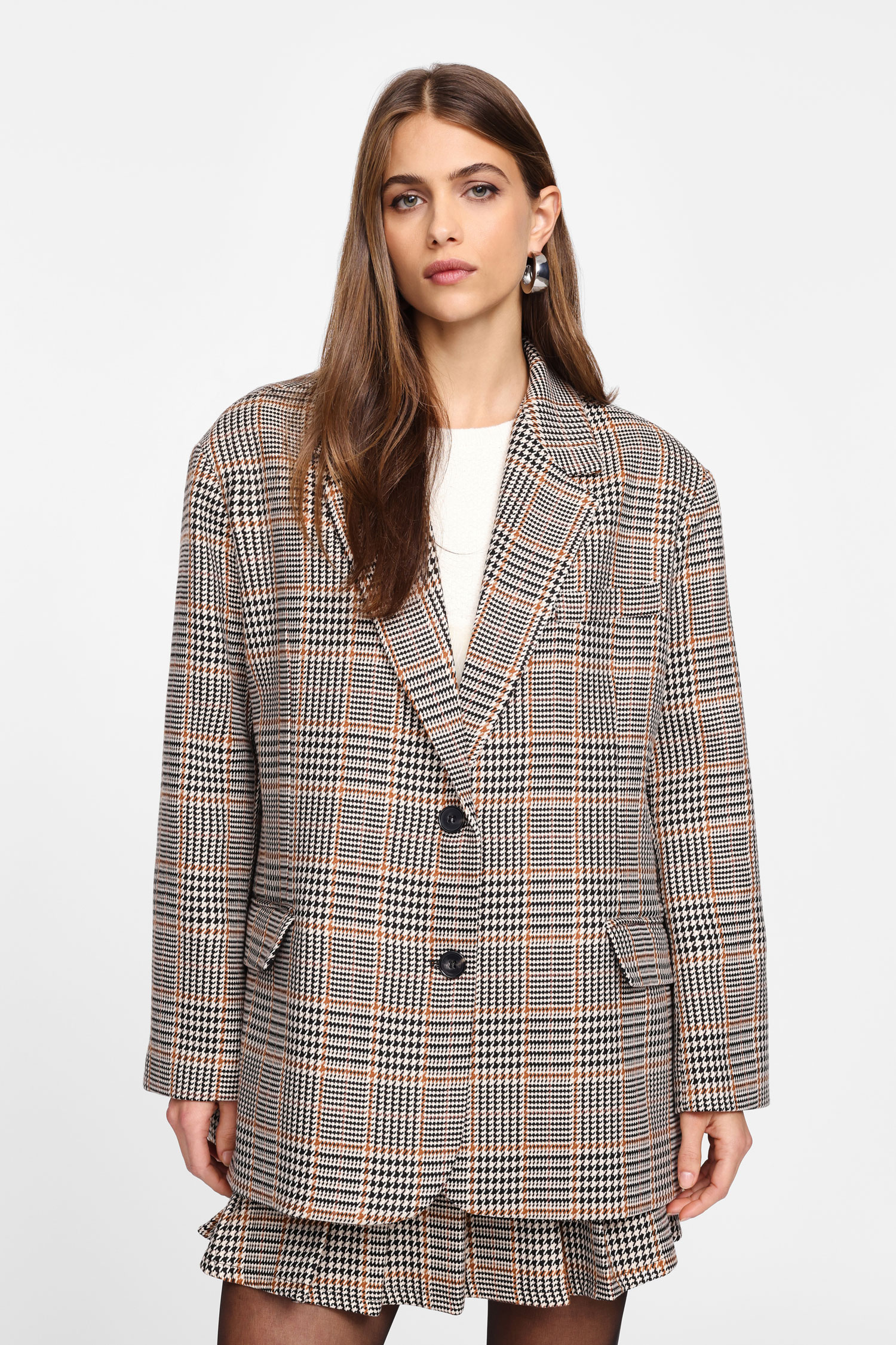 Image of Blazer scozzese con bottoni e spalle imbottite060