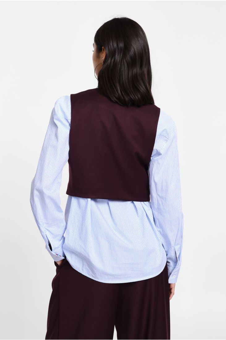 Vest with single button closure